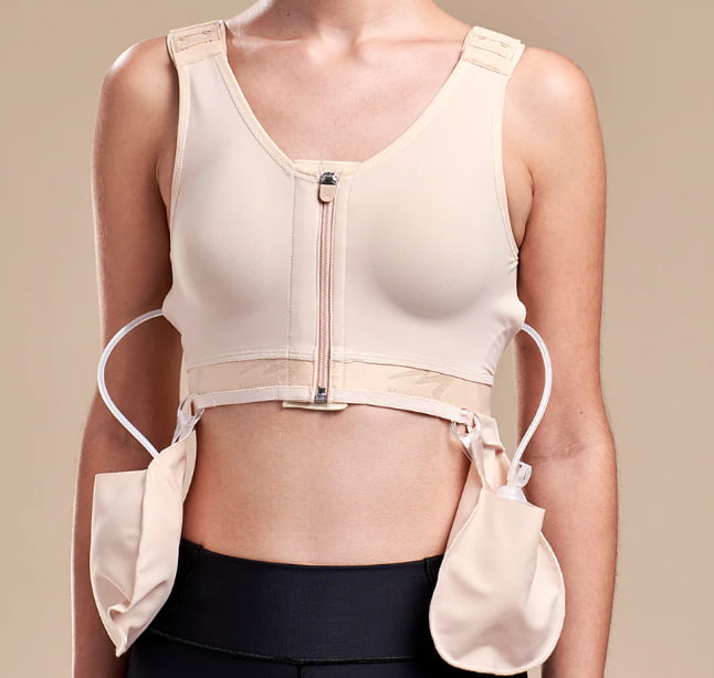 Compression bra with drains