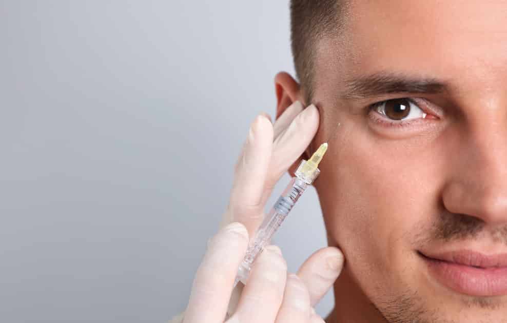man getting facial injection
