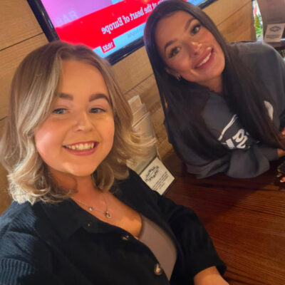Chloe with her sister at the airport
