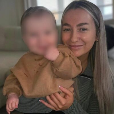 Leah with her first child